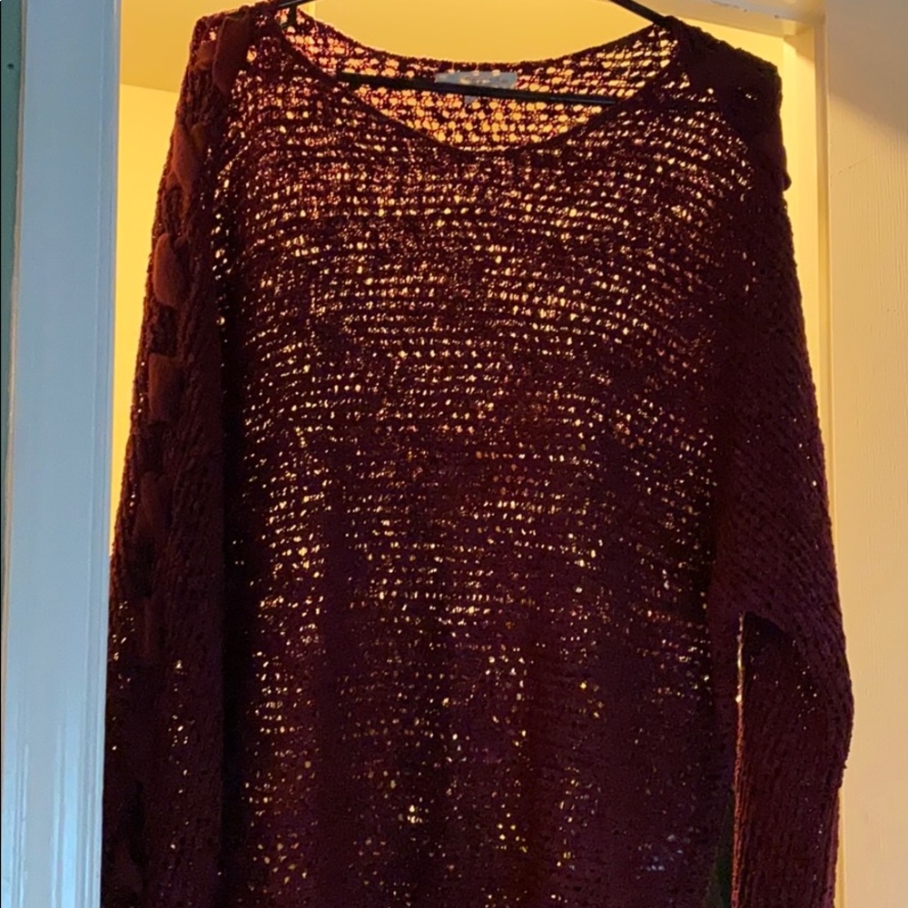 Maroon sweater with lace up arms